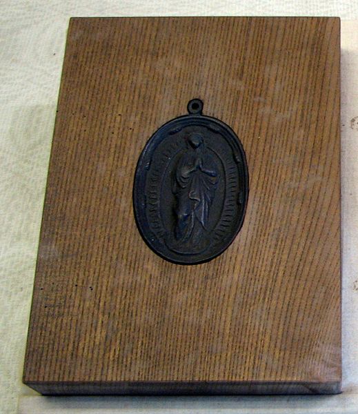 Image:Virgin Mary tile to step on.jpg